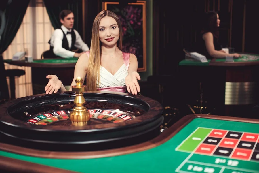 Tampilan meja live dengan dealer dan area taruhan INDO126
